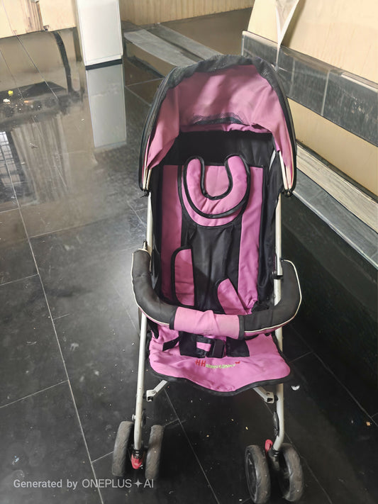 Baby Stroller with comfortable seat and protective canopy.