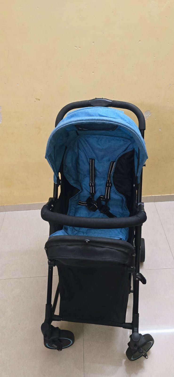 MEE MEE 2-in-1 stroller/pram with rocking function, foldable design, reclining seat, adjustable canopy, 5-point safety harness, smooth wheels, and storage basket for comfortable travel and soothing babies.