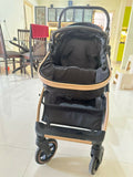 StarAndDaisy EasyGo travel-friendly luxury baby stroller pram buggy with reclining seat, smooth wheels, safety harness, adjustable canopy, and compact design for comfortable baby travel.