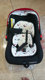 Babyhug Amber Car Seat Cum Carry Cot with padded seating, secure safety harness, ergonomic carry handle, protective canopy, and versatile design for comfortable travel with newborns and infants.