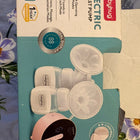 BABYHUG Double Electric Breast Pump for expressing breast milk from both breasts during pumping sessions.
