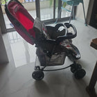 BABYHUG 2 in 1 Rock and Roll stroller cum rocker with reclining seat, sturdy wheels, safety harness, canopy, and dual stroller-to-rocker design for baby comfort and travel.