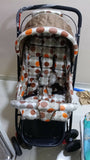 BABYHUG stroller with a lightweight foldable design, reclining seat, adjustable canopy, 5-point safety harness, smooth wheels, and spacious storage basket for comfortable travel with babies and toddlers.