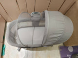 MASTELA Dream Starlight bedside bassinet and rocker with sunshade, mosquito net, removable cradle basket, touch control panel, and a sturdy frame for comfortable sleeping and soothing newborns.