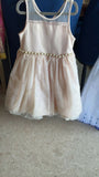 Beige partywear dress for girls featuring elegant styling, soft fabric, comfortable fit, and a charming look for birthdays, celebrations, weddings, and special occasions.