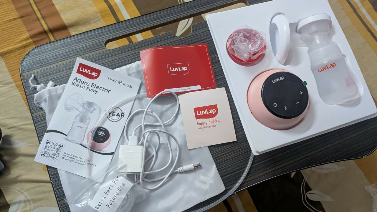 LuvLap Adore electric breast pump with adjustable suction levels, soft silicone breast cushion, quiet operation, and efficient milk expression for comfortable breastfeeding support.