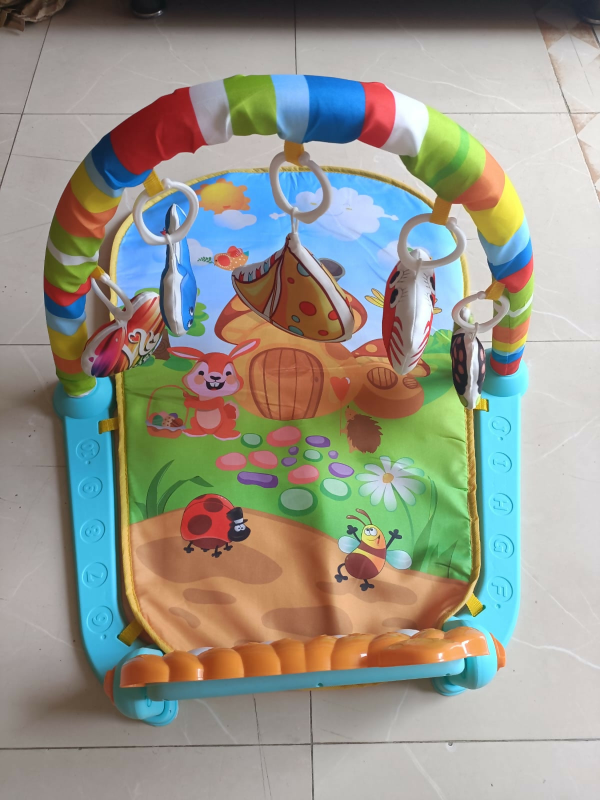 Encourage sensory exploration and musical play with the Karmax Baby's Piano Gym Mat, offering a multi-sensory experience and interactive piano keyboard for your baby's development.