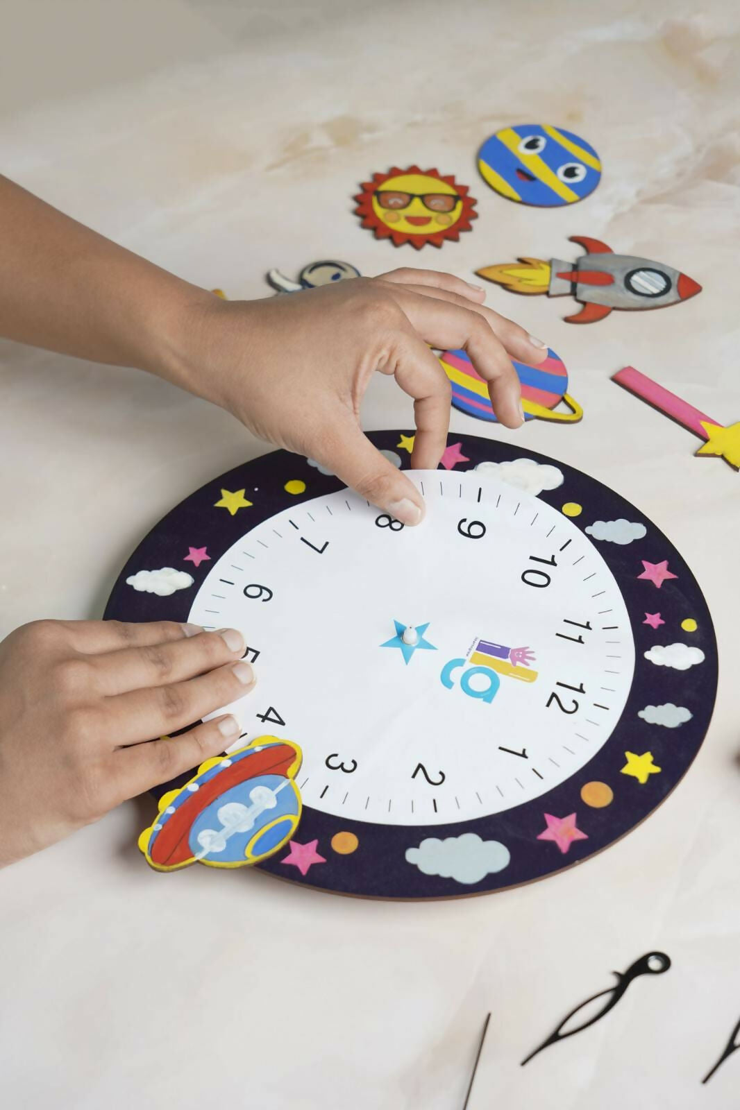 Transform your child's room into a cosmic sanctuary with the Cosmic Creations DIY Space Exploration Clock Kit. 