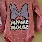 Pink 'Minnie Mouse' onesie with a purple bow 