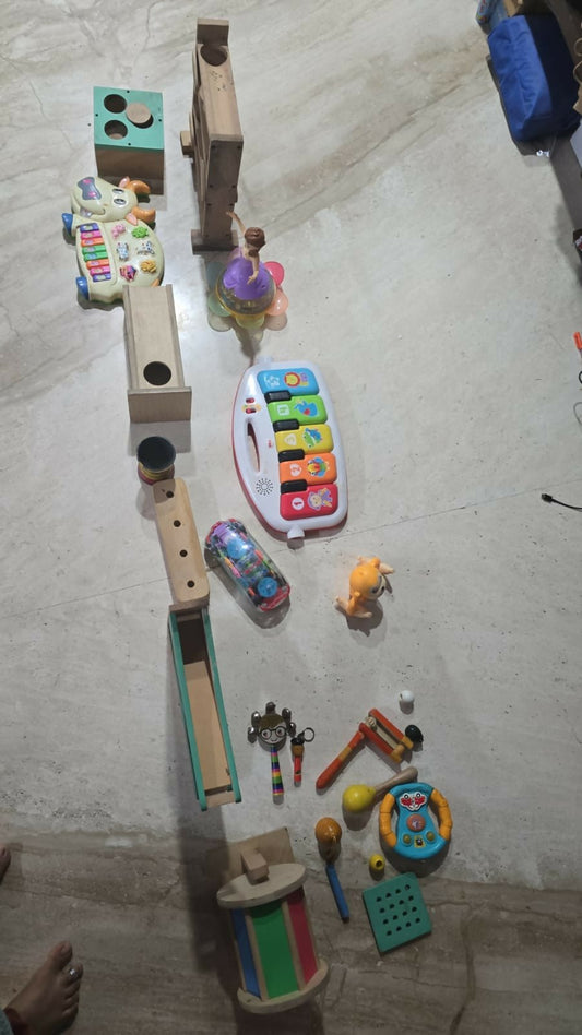 CURIOUS CUB Channapatna Wooden Toy Set (19 Pieces) featuring handcrafted wooden toys made with child-safe materials, vibrant natural colors, and smooth finishes to encourage imaginative play, fine motor skills, and early learning.