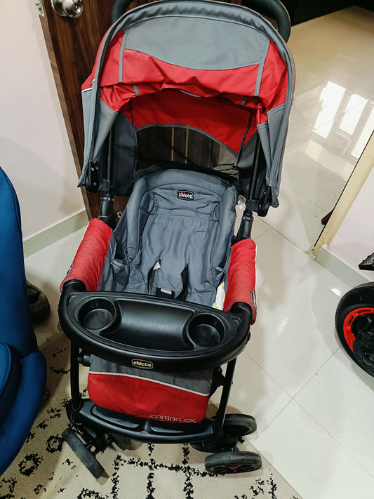 Chicco Cortina Baby Stroller with comfortable reclining seat, protective canopy, safety harness, smooth wheels, foldable frame, and spacious storage basket for convenient everyday outings with babies and toddlers.