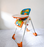 Chicco Polly foldable baby high chair with reclining feeding seat, adjustable tray, cushioned seating, sturdy frame, and premium design for comfortable baby mealtime and feeding.