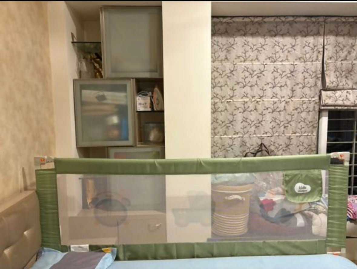 Kidstation Bed Railing in Almost New condition, available in Pune, featuring a sturdy safety barrier, secure attachment design, and protective bedside support to help prevent children from accidentally rolling off the bed.