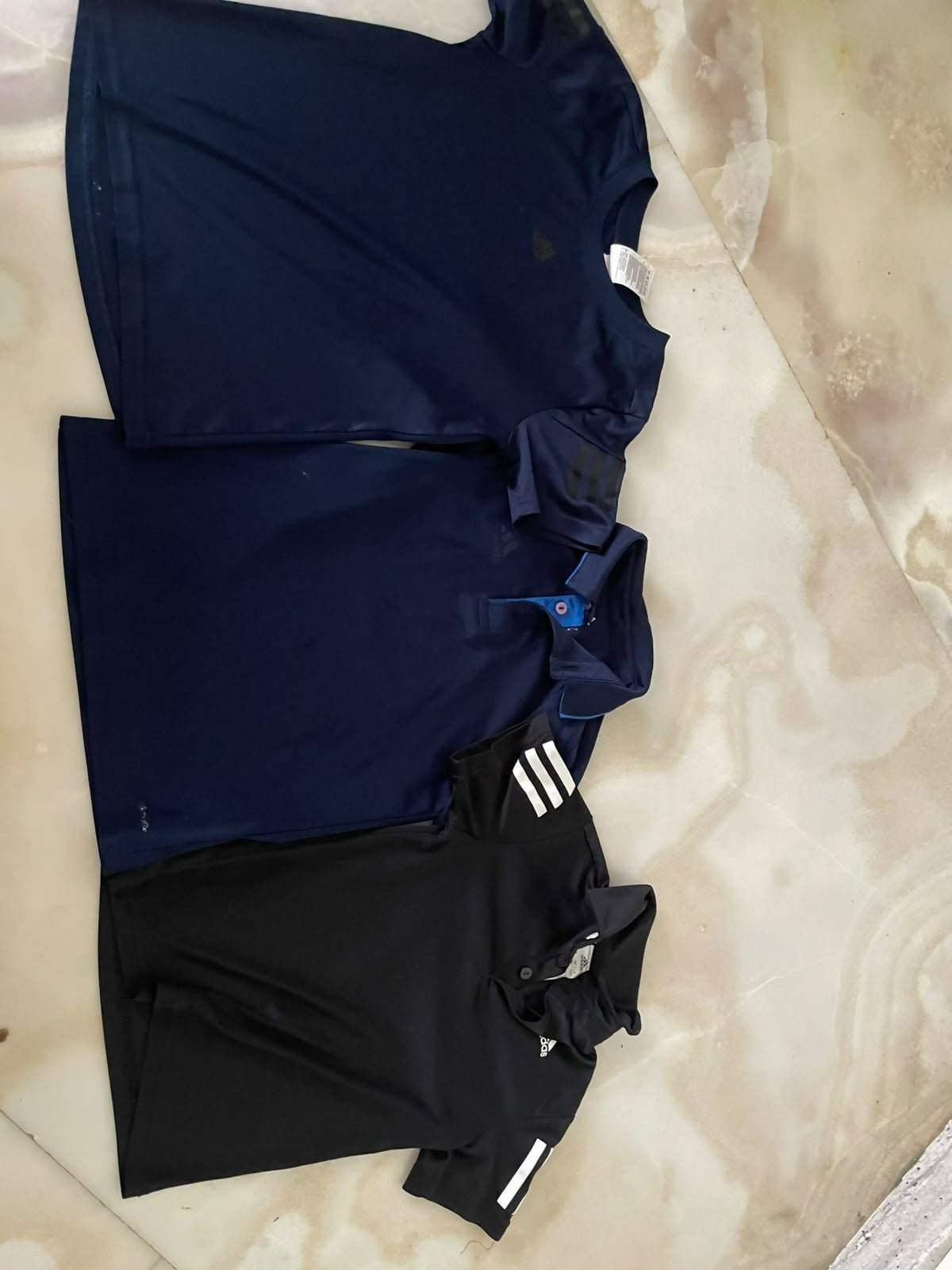 ADIDAS ORIGINALS T-shirts featuring soft comfortable fabric, classic fit, iconic logo design, and versatile styling for everyday wear, sports, and casual outings.