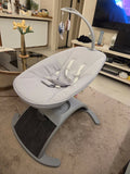 Chicco Comfy Wave baby bouncer with cushioned seat, gentle bouncing motion, safety harness, ergonomic support, and comfortable space for baby relaxation, play, and rest.