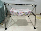 A TO Z HUB portable folding Ghodiyu traditional baby cradle with black cotton cloth, foldable metal frame, gentle rocking design, and a comfortable sleeping space for newborns and infants.