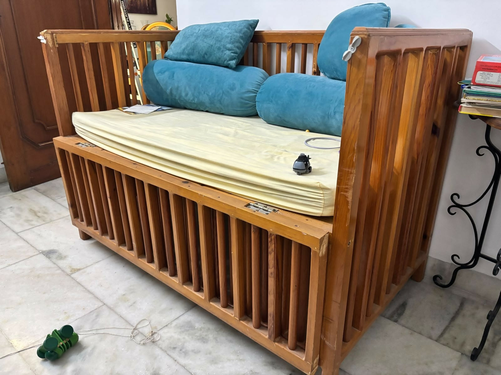 Baby Crib/Cot in Some Used condition featuring a sturdy frame, spacious sleeping area, protective side rails, and practical design for creating a comfortable sleeping space for babies.