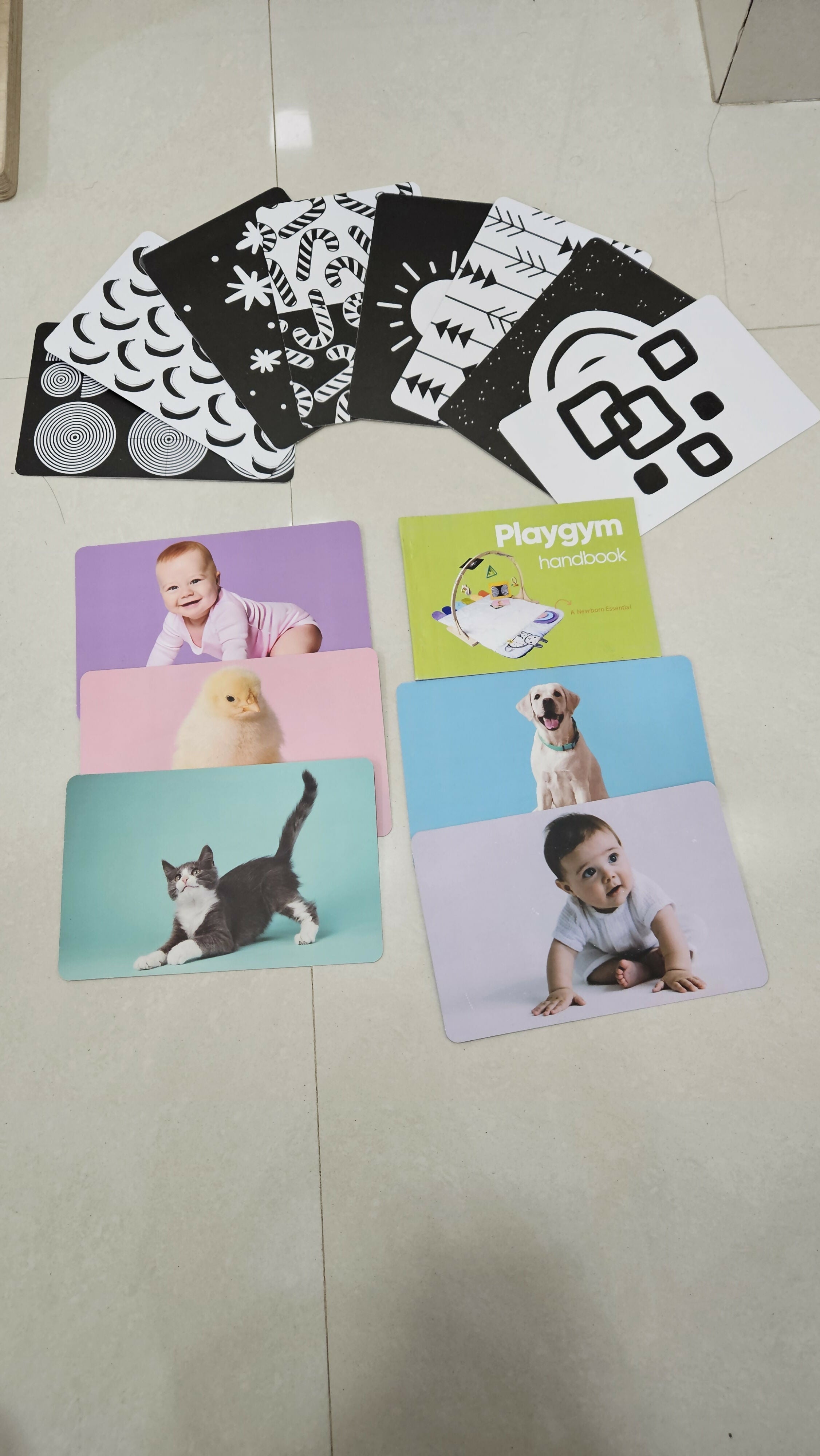 Curious Cub playgym with soft play mat, hanging sensory toys, interactive activity features, and engaging design to support baby development, tummy time, and play.