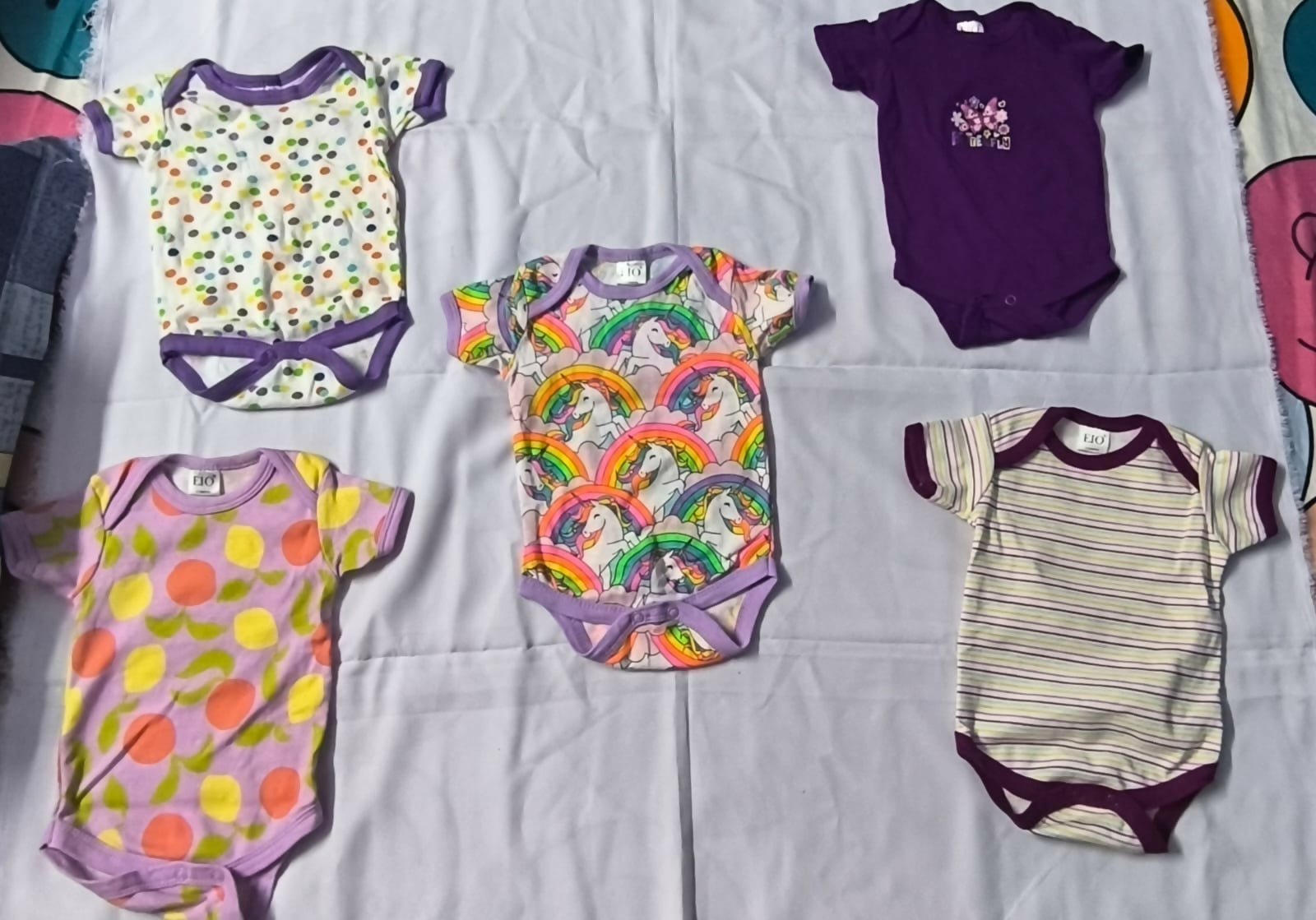 EIO baby bodysuit set (pack of 5) featuring soft breathable fabric, snap-button closures, and comfortable everyday essentials for newborns and babies.