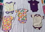 EIO baby bodysuit set (pack of 5) featuring soft breathable fabric, snap-button closures, and comfortable everyday essentials for newborns and babies.