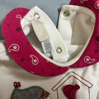 Keep your baby snug during mild chilly days with this soft cotton top and bottom set. 