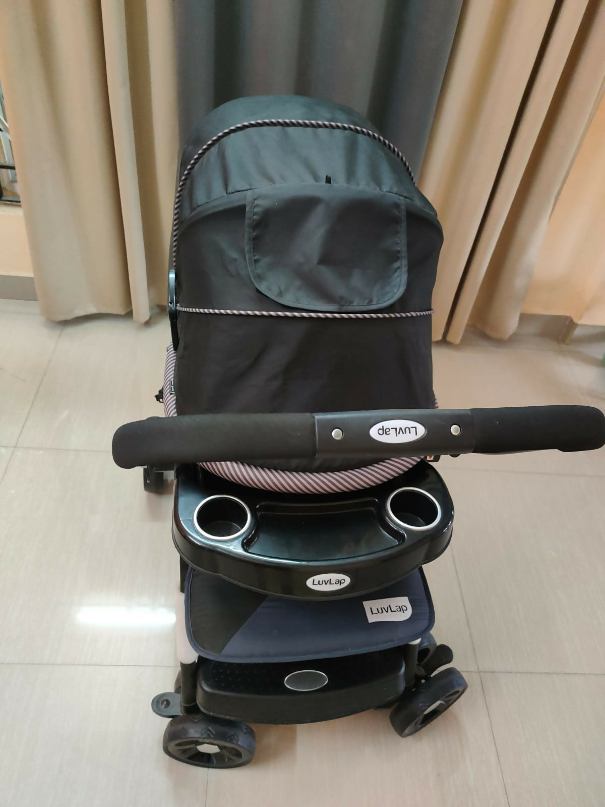 Buy LuvLap Baby Stroller – Safe, foldable pram with reclining seat, safety harness, and storage basket for newborns and toddlers.
