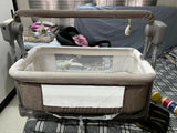 STAR AND DAISY Automatic Cradle with gentle automatic rocking, sturdy frame, comfortable sleeping area, breathable design, and secure construction to help soothe and comfort newborns during rest.
