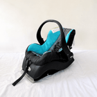 Evenflo Embrace infant car seat with base, rear-facing design, cushioned newborn support, secure safety harness, and portable baby carrier functionality for safe travel.
