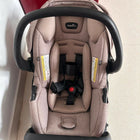 Evenflo LiteMax infant car seat with cushioned newborn support, secure safety harness, lightweight portable design, and comfortable seating for safe baby travel.