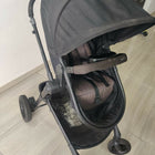 Evenflo travel system with baby stroller and infant car seat, featuring a foldable design, reclining seat, adjustable canopy, 5-point safety harness, and spacious storage basket for convenient travel.