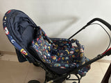 Babyhug Cosy Cosmo Stroller with a lightweight foldable frame, reclining seat, adjustable canopy, 5-point safety harness, smooth wheels, and spacious storage basket for safe and comfortable travel with babies and toddlers.