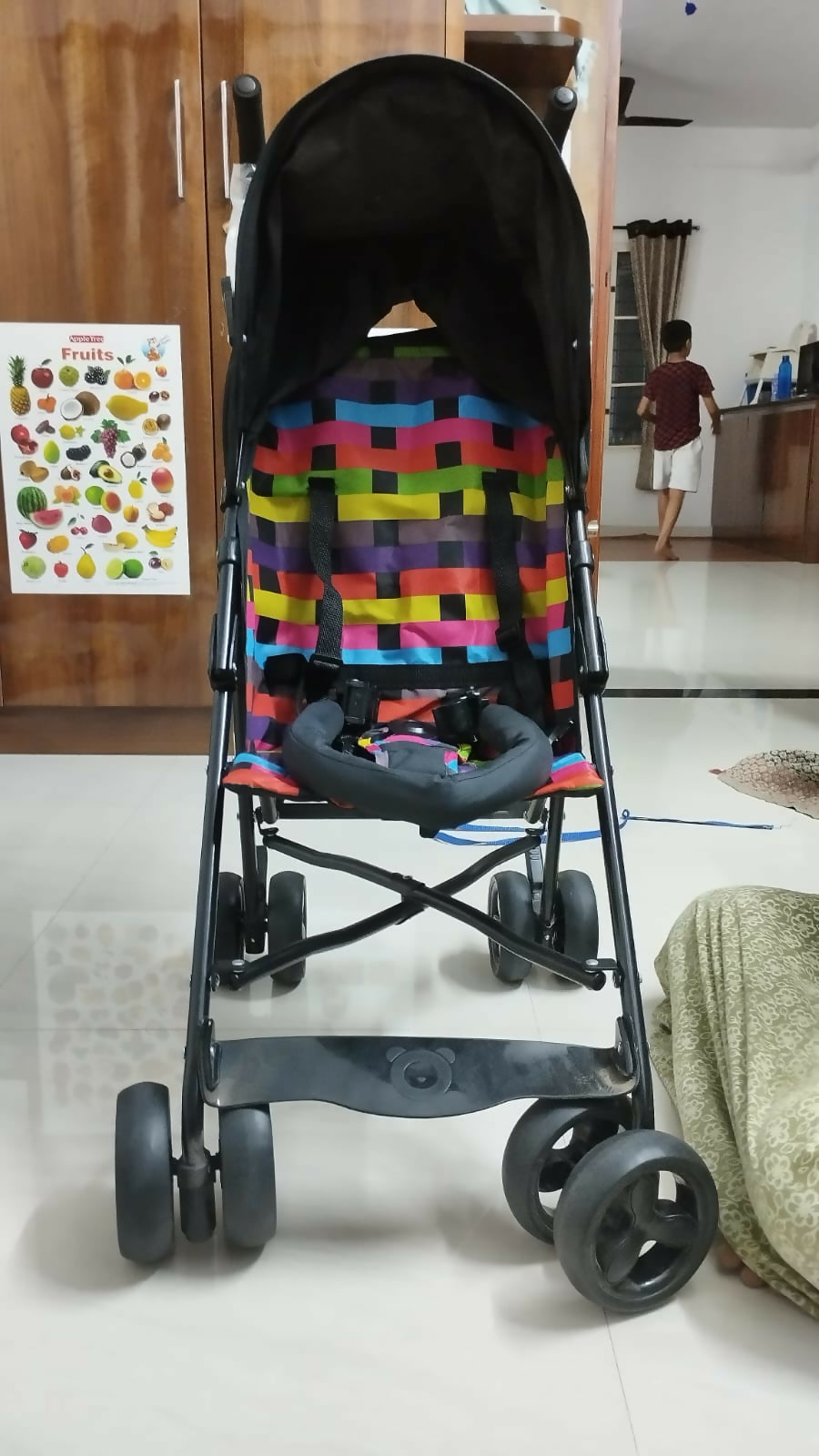 Experience comfort and safety with the LUVLAP Tutti Fruity Stroller/Pram, featuring a reversible handle, adjustable canopy, and three reclining positions for your baby’s needs.
