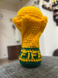 Handcrafted crochet FIFA World Cup-inspired keychain made from soft yarn, featuring a miniature football-themed design with durable key ring attachment, perfect for football fans, gifting, and everyday use.