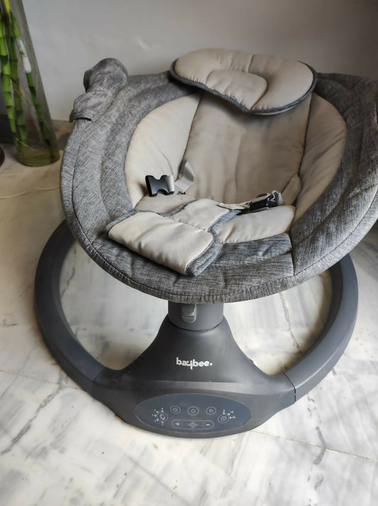 Soothe and entertain your baby with the gentle motion and soothing melodies of the BAYBEE Electric Swing - comfort and convenience for both baby and parents!