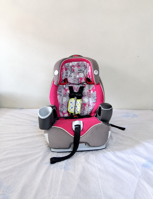 GRACO Nautilus 65 3-in-1 Harness Booster Car Seat B148 in Some Used condition featuring harness, high-back booster and backless booster modes, padded seating, and an adaptable design for growing children.