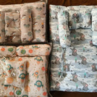 Soft imported baby pillow bedding set with elephant and space-themed prints, cushioned sides, and comfortable support for newborn babies.