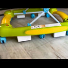Colorful baby walker on a wooden floor
