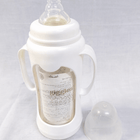 Giggles 210ml Glass Feeding Bottle with dual handles, BPA-free glass, soft silicone nipple, and ergonomic design for comfortable, safe, and easy feeding for babies learning to hold a bottle.