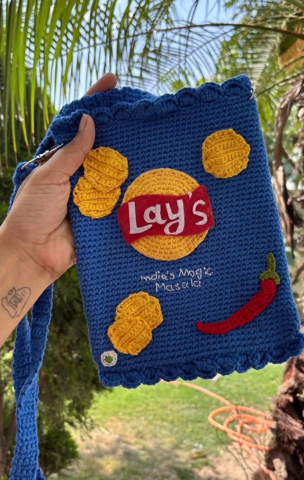 Handmade crochet bag for girls crafted from soft, durable yarn with a stylish design, comfortable strap, and lightweight construction for everyday use, outings, and special occasions.