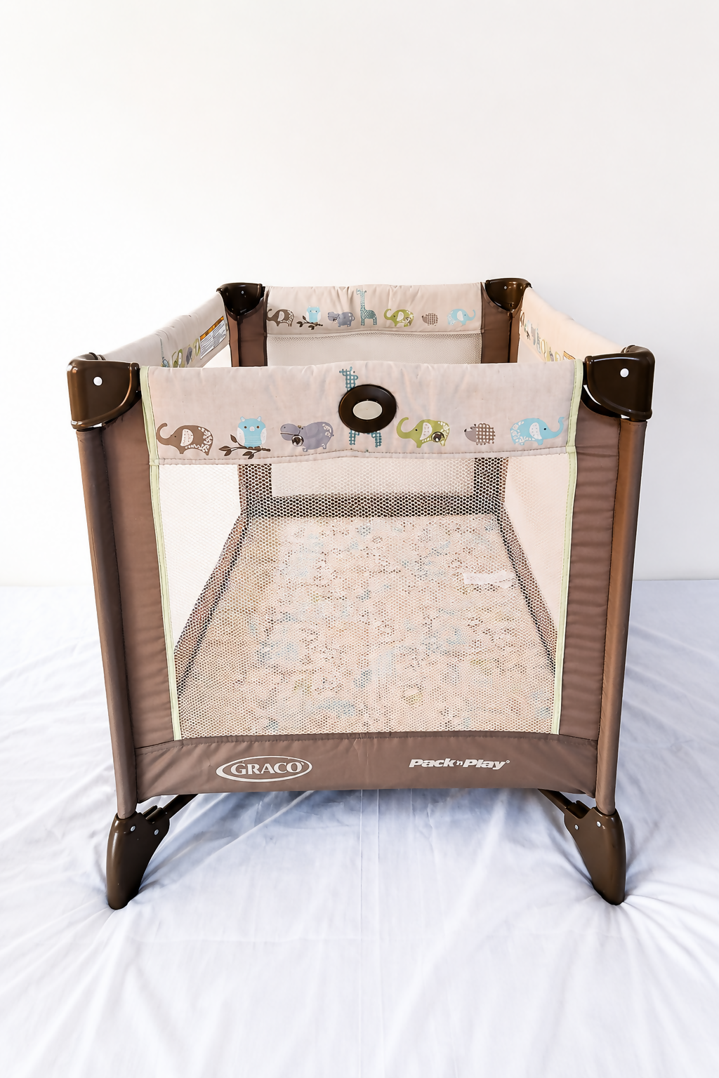 Graco Pack 'N Play Baby Playard Portable Travel Cot B138 in Some Used condition featuring foldable design, breathable mesh sides, animal print, and a spacious enclosed area for supervised play and rest.