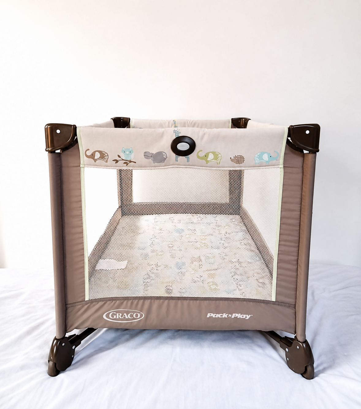 Graco Pack 'N Play Baby Playard Portable Travel Cot B138 in Some Used condition featuring foldable design, breathable mesh sides, animal print, and a spacious enclosed area for supervised play and rest.