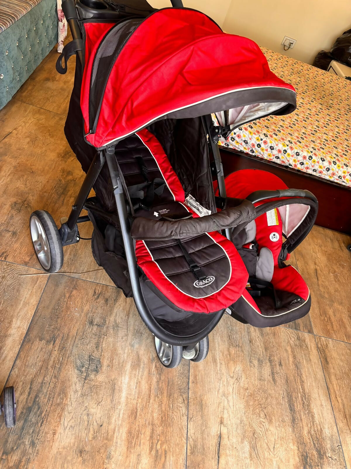 GRACO Air Click 3 Travel System with baby stroller and infant car seat, featuring a convenient click-connect design, reclining stroller seat, protective canopy, safety harness, and comfortable infant seating for everyday travel.