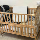 HUNY HUNY 15-in-1 Baby Crib/Cot with convertible multifunctional design, sturdy frame, adjustable mattress height, storage options, and a safe, comfortable sleeping space for newborns and growing babies.