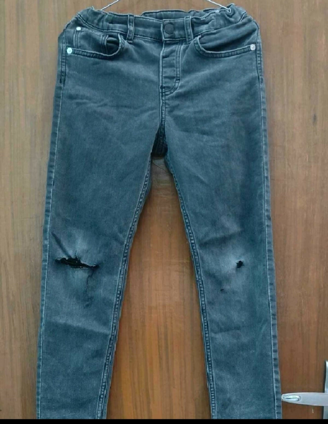 H&M Ripped Jeans in Some Used condition featuring a trendy distressed denim design, comfortable fit, and stylish casual look for everyday wear, outings, playdates, and casual occasions.