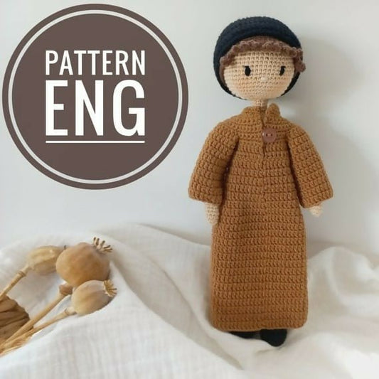 Hand Crocheted Vintage-Style Doll crafted with soft yarn, intricate handmade detailing, charming retro-inspired clothing, and a classic heirloom look for gifting, nursery décor, imaginative play, or keepsakes.