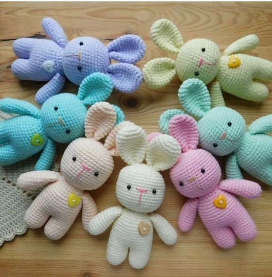 Handcrafted crochet bunny made from soft yarn with intricate stitching, adorable floppy ears, and a cuddly design, perfect for babies, kids, gifting, and nursery décor.
