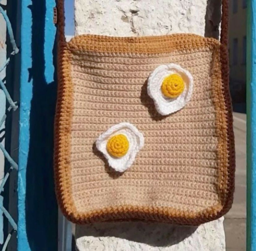 Handmade crochet bag for girls crafted from soft, durable yarn with a stylish design, comfortable strap, and lightweight construction for everyday use, outings, and special occasions.