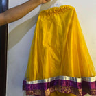 Dress your little one in this vibrant Yellow and Purple Traditional Chaniya Choli for a stunning, festive look!







