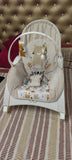 INFANTSO baby rocker and bouncer in beige for 0–2 years with cushioned seat, gentle rocking motion, secure harness, and comfortable design for baby relaxation and play.