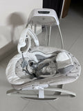 INGENUITY gliding swing and rocker with gentle gliding motion, cushioned seat, safety harness, and soothing design for relaxing, comforting, and entertaining babies.